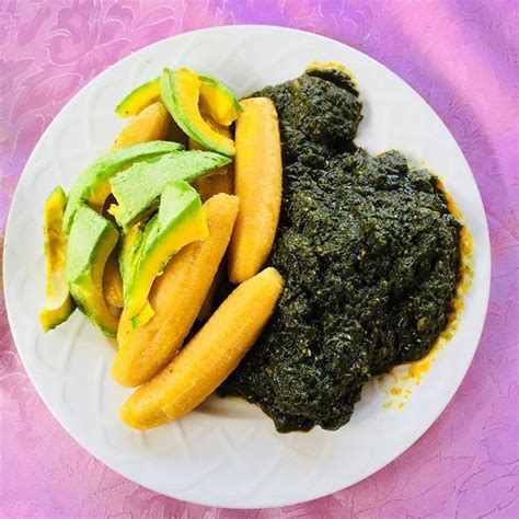 African Food Boiled Green Bananas Topped With Avocados And Traditional