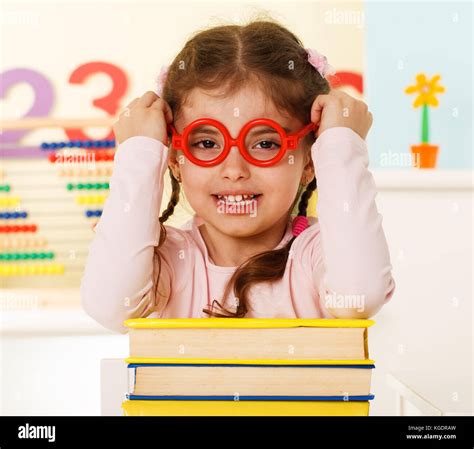 Preschool Girl With A Books Stock Photo Alamy