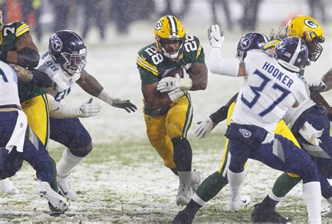 Packers Vs Titans Recap Green Bay Rolls At Snowy Lambeau Field