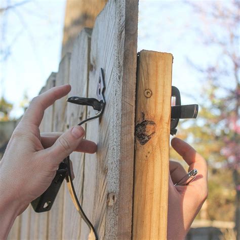 Anchoring the post into concrete. DIY tutorial install National Hardware gate latch ...