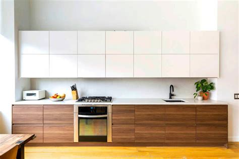 A slab cabinet door style is preferred, as it is a smooth slab of material with no panels, accents or embellishments, giving it a sleek look. The 411 On Kitchen Cabinet Door Designs | Sweeten Blog