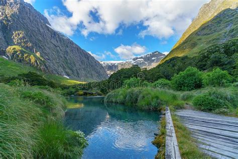 Wooden Bridge Over River In The Mountains Fiordland New Zealand 11