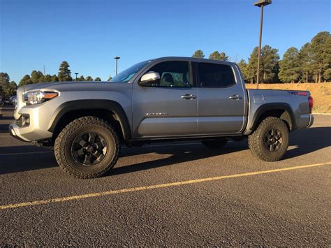 Then would a 2 inch or 3 inch leveling kit give me some room to fit bigger tires on it cause right now i can fit 17 inch tires on them. Put 255/85/16s on stock OR wheels and suspension