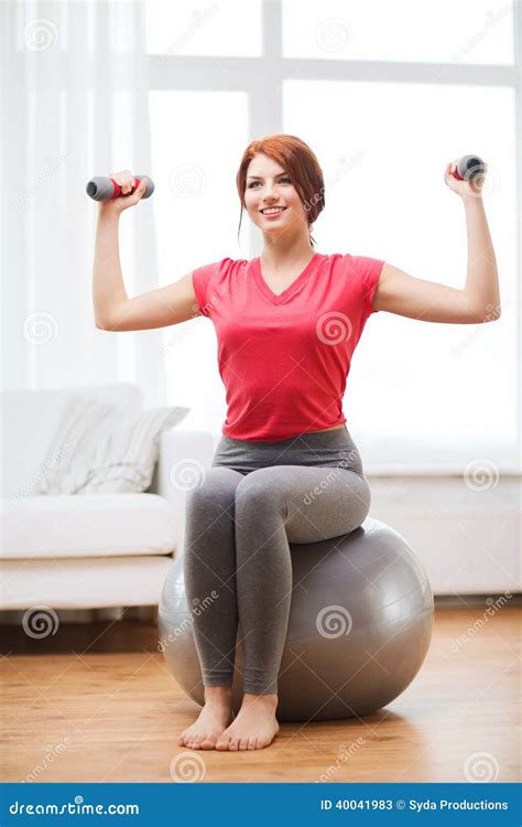Smiling Redhead Girl Exercising With Fitness Ball Stock Image Image