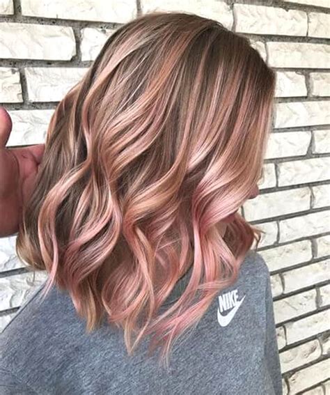 One huge advantage about rose gold hair colors is how well they blend with a variety of both hair colors and skin tones. rose-gold-hair-trend-2019-min | Ecemella