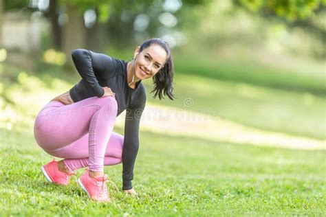 Young Woman Runner Warming Up Before Running Stock Photo Image Of