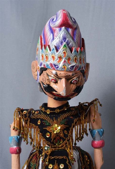 It has a similar type of traditional wooden puppets to bali. Wayang Golek - Rod Puppet - Keriscollection