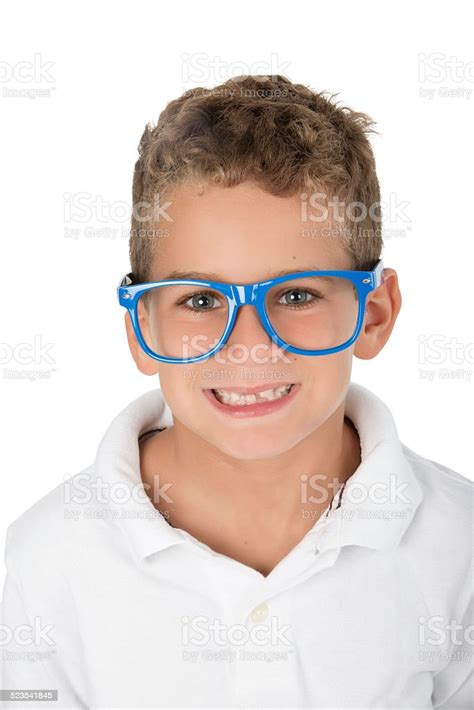 Young Caucasian Boy Wearing Big Glasses Makes Funny Face Stock Photo