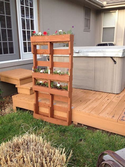 Along with a highly dignified and elegant look, wood wall paneling also provides thermal and acoustic insulation to a interior! Pallet Privacy Living Wall (With images) | Pallet garden walls, Diy pallet vertical planter ...