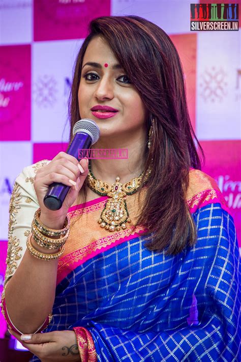 (jayaraman & leela ram) photography assistant: Trisha Krishnan at the Launch of NAC Jewellers Necklace ...