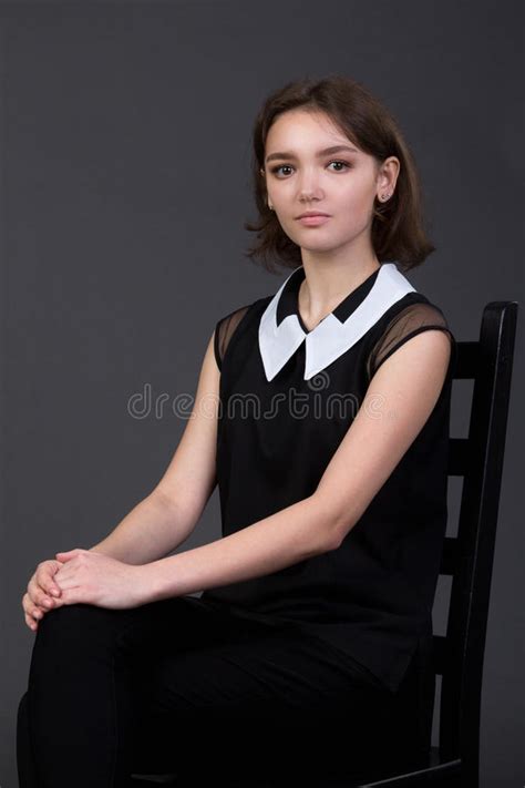 Young Beautiful Girl Sitting On A Chair Stock Image Image Of Young