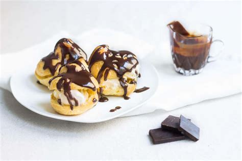 Drizzle filled profiteroles with chocolate sauce, if desired. Profiteroles Recipe | Cream Puffs with Chocolate Sauce ...