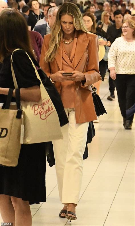 Elle Macpherson Rocks A Leather Jacket As She Touches Down In Sydney