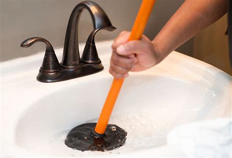 How To Clear Clogged Sink Drains With A Plunger At The Home Depot