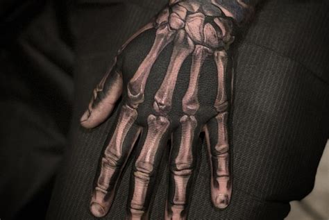 100 Fantastic Skeleton Hand Tattoos Cool And Unique The Trend Scout