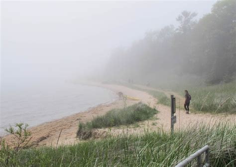 3 Fog Floats In Off Of Lake Michigan Along The Beach Of Whitefish