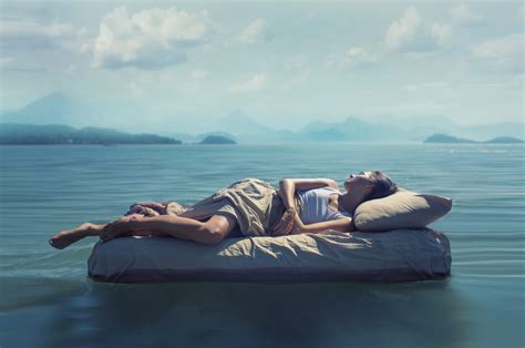 Sleeping Woman Lies On Airbed Floating On A Lake Your Health