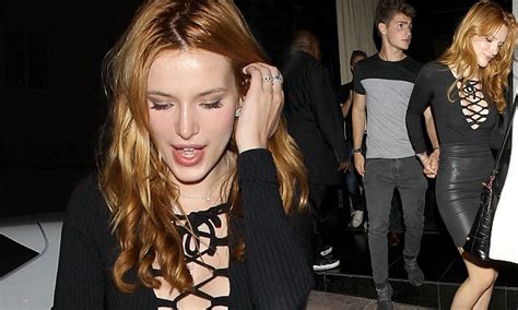 Birthday Girl Bella Thorne Goes Braless In A Plunging Tie Up Top And