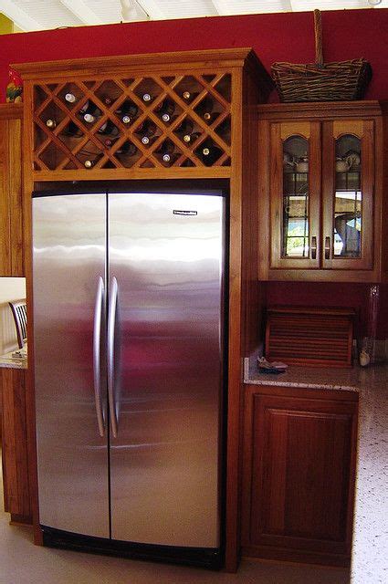 Or, above the cabinet into the drywall, on the last inch of back panel. wine rack above fridge | Home kitchens, Home, Kitchen