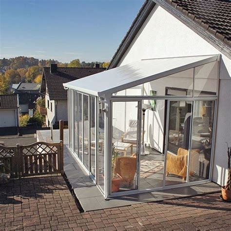 It can afford shelter from the elements or create a space that allows for indoor/outdoor seating or sun bathing. SanRemo™ patio enclosure / sunroom / conservatory kit is used to extend a private home in Ge ...