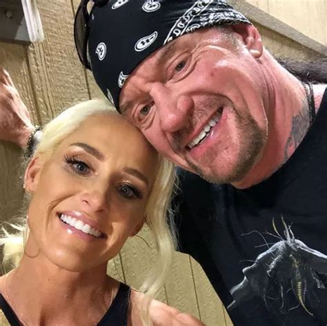 Undertaker And His Wife Michelle Mccool Undertaker Famous Wrestlers