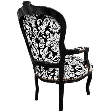 Covered with a gray blanket. Baroque armchair Louis XV style with white floral fabric ...