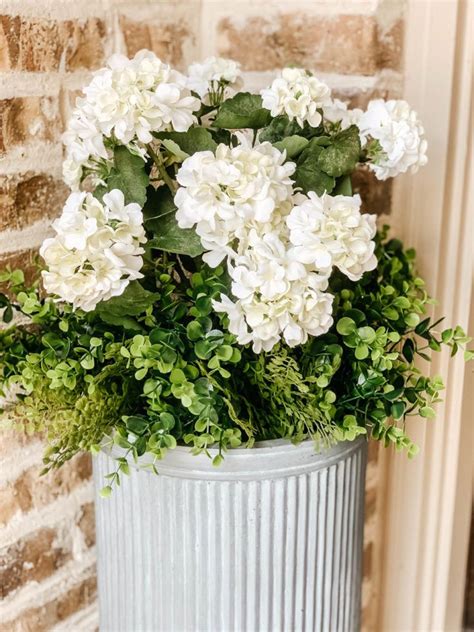 Keep life easy and beautiful with artificial flowers and plants. How to Fill An Outdoor Planter with Artificial Flowers and ...
