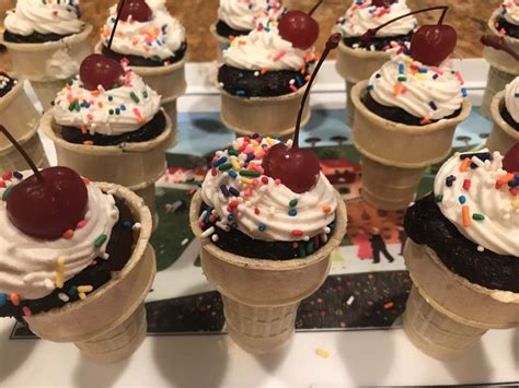 Ice Cream Sundae Cupcakes With Rainbow Sprinkles And A Cherry On Top