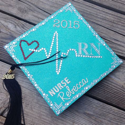 A Blue Graduation Cap With The Word Nurse On It