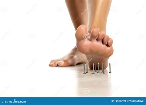A Woman S Foot Stepped On Nails On White Stock Photo Image Of Danger