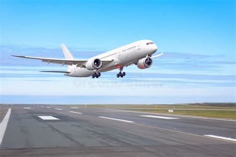 Passenger Plane Jet Fly Up Over Take Off Runway From Airport Stock