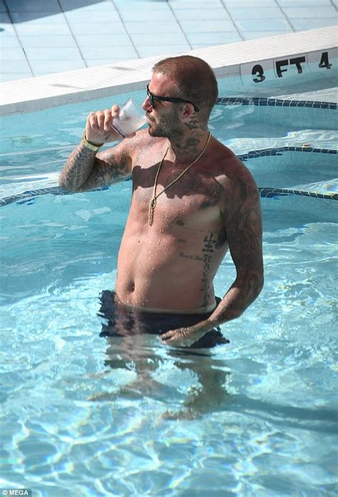 Shirtless David Beckham Flaunts His Impressive Physique As He Relaxes By The Pool In Miami Photos