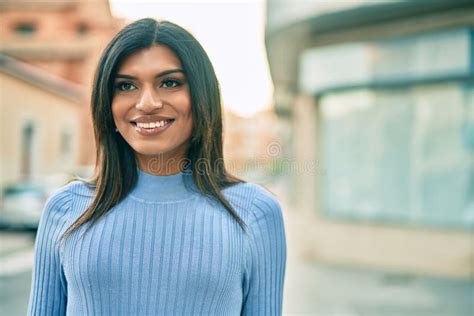 Beautiful Hispanic Woman Smiling Confient At The City Stock Image