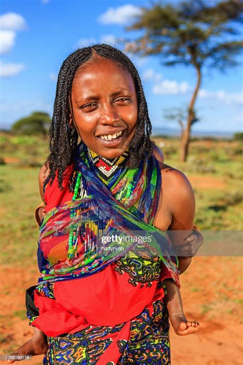 Young Mother From Borana Tribe Carrying Her Baby Ethiopia Africa High
