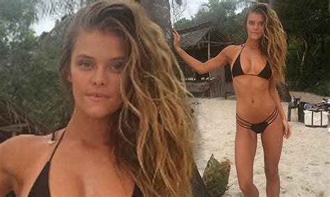 Nina Agdal Flaunts Her Body In Skimpy Black Bikini With Racy Cut Outs Daily Mail Online