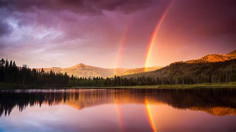 Green Trees Covered Mountain With Rainbow Reflection On River Hd