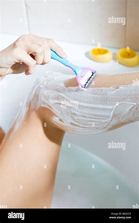 Woman In Bathtub Shaving Legs Hi Res Stock Photography And Images Alamy