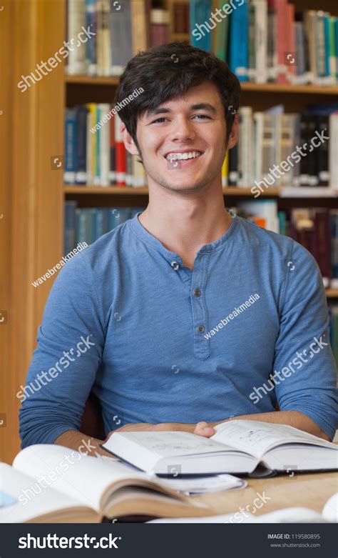 Man Sitting Table Library While Smiling Stock Photo 119580895