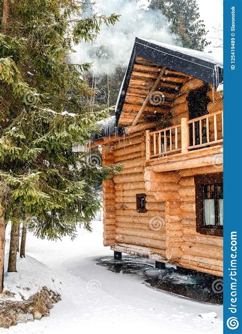 Wooden Cottage House In Mountain Resort Christmas Winter