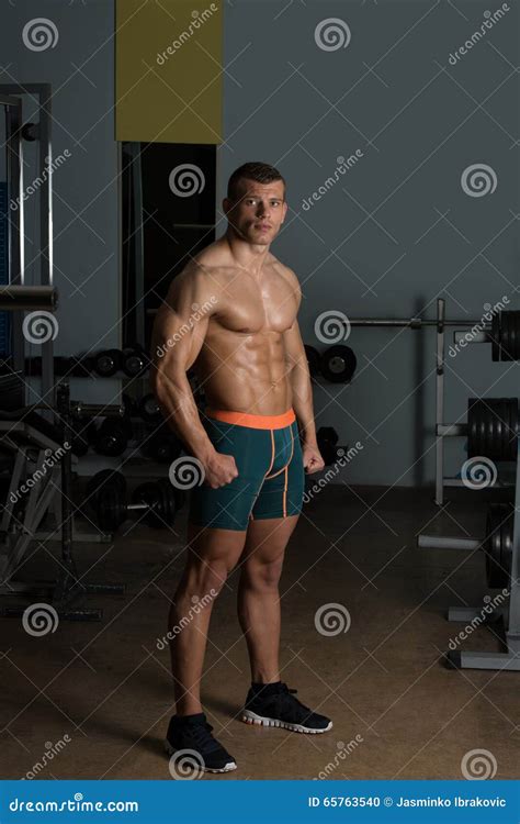 Muscular Man Flexing Muscles Stock Photo Image Of Caucasian Kick