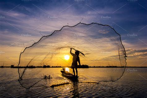Fishermen Throwing Net Fishing High Quality Nature Stock Photos