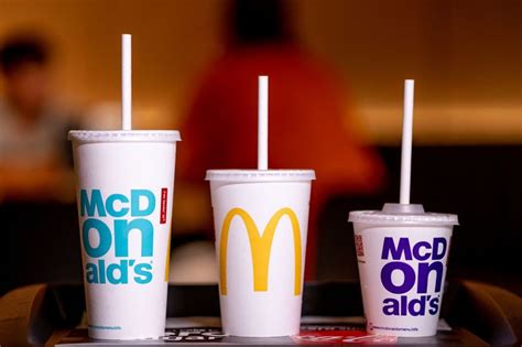 McDonald S Worker Reveals What The Buttons On Its Drinks Lids Really