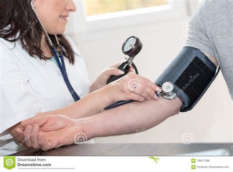 Doctor Measuring Blood Pressure Stock Photo Image Of Measurement