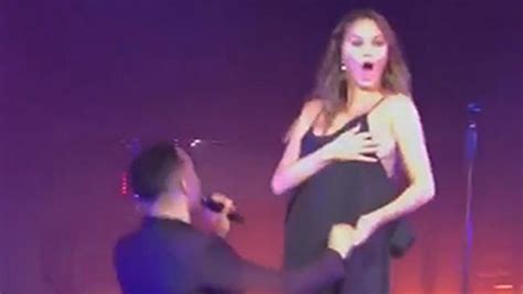 chrissy teigen s nip slip at john legend concert is an epic wardrobe malfunction au