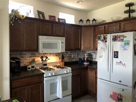 Instead, we had our panels cut down to 61″ at lowes. Faux brick kitchen backsplash | Brick kitchen