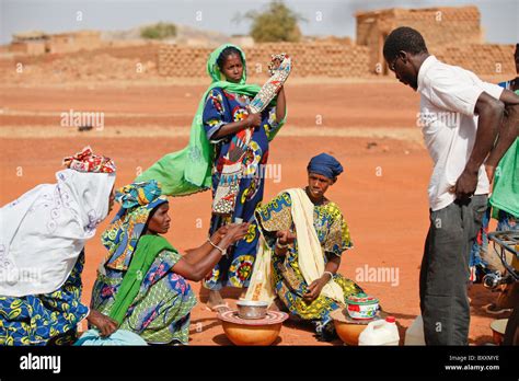 Here Women Arrive In Djibo Burkina Faso Carrying Fresh Milk For Sale