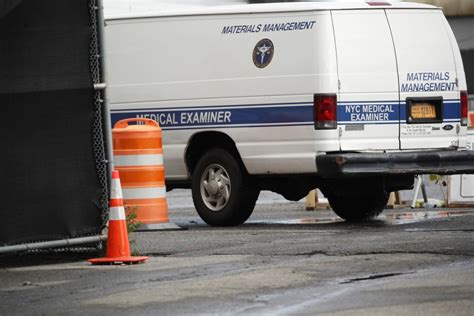 man found dead in garbage bag inside of cart at bronx intersection nypd