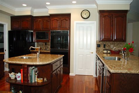 All wood and plywood cabinets can be repainted. Kitchen Cabinet Refinishing - Comwest Construction