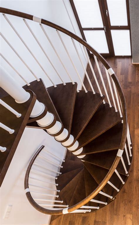 A spiral staircase is a type of staircase where a series of steps winds around a central column or a 03. A spiral staircase will help save space and avoid too many ...
