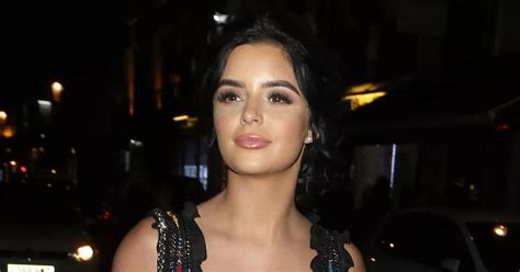 demi rose shows off sensational curves in metallic bikini as she poses for sexy bedroom video